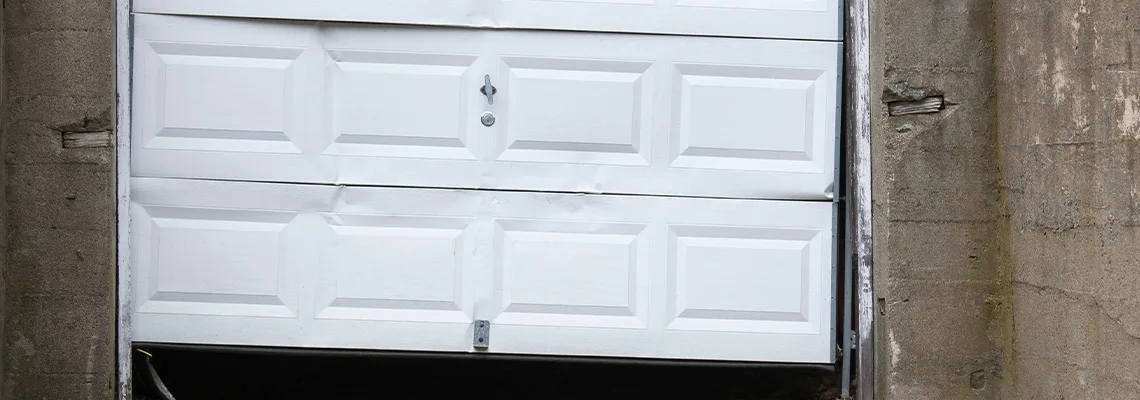 Garage Door Got Hit By A Car Dent Removal in Aurora, IL